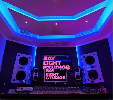 The SSL Room control desk at Bay Eight Studios, framed by the LED ceiling