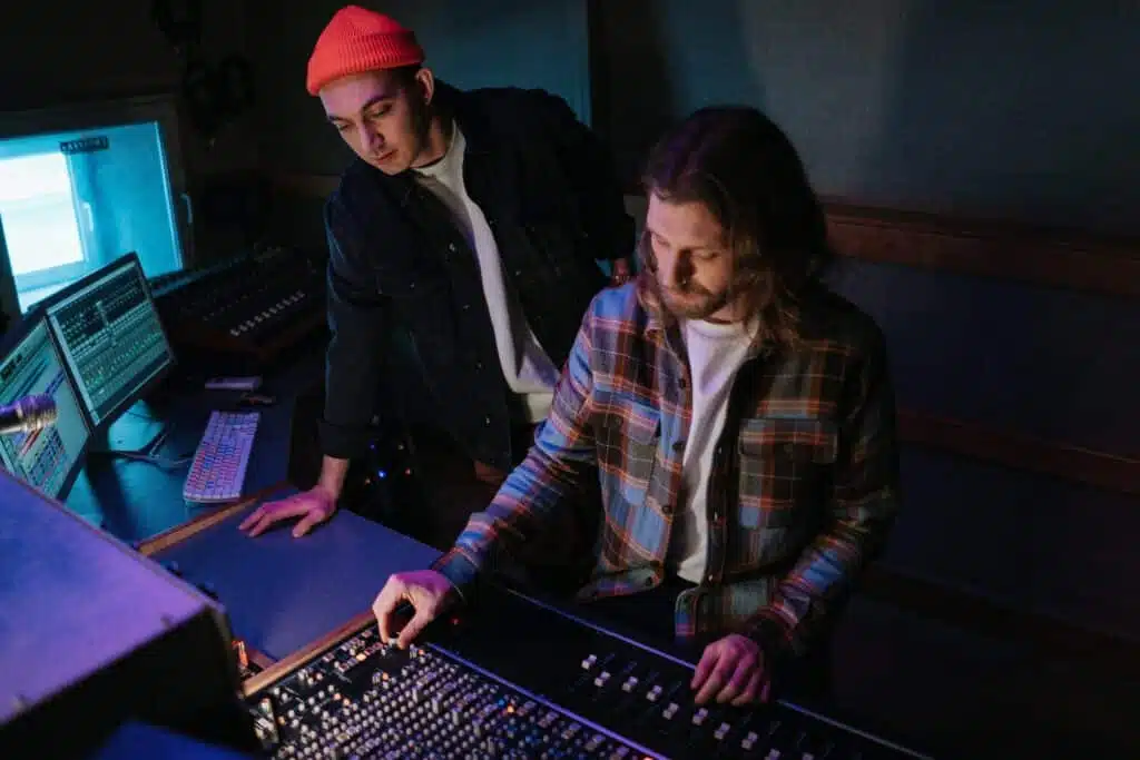 Two Men Using Audio Equipment
Pexels Cottonbro 7087608