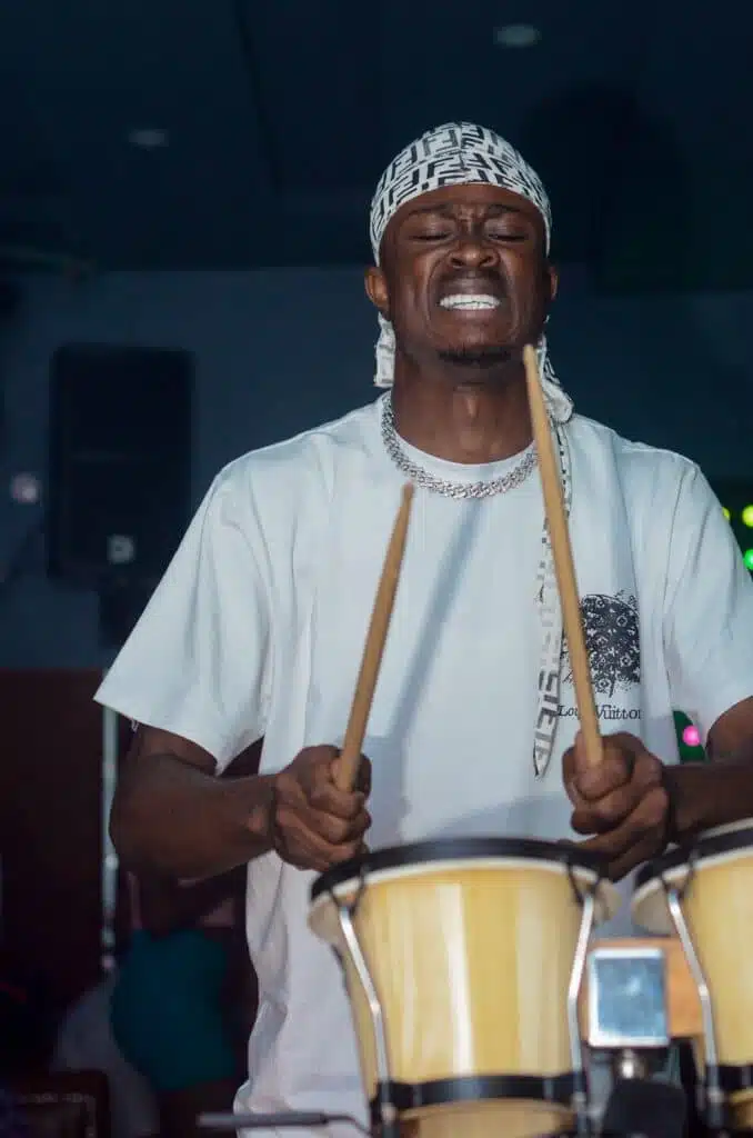 Black man playing drums 