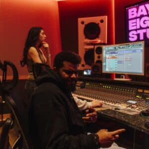 Bay Eight Record Studios Miami sound engineer and producer Paniik at mixing board