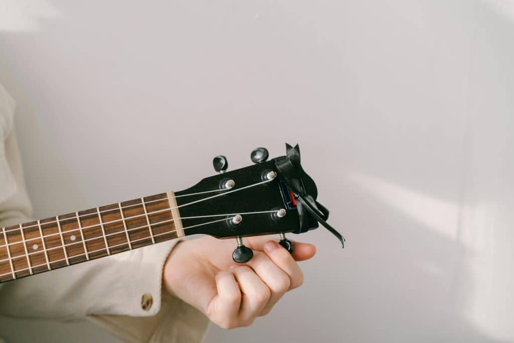 Pexels Mikhail Nilov 7573282 studio recording process tuning ukulele