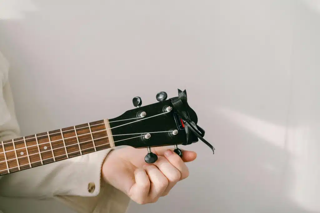 Pexels Mikhail Nilov 7573282 studio recording process tuning ukulele